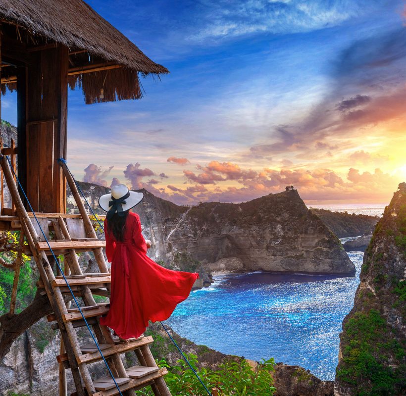 young-girl-steps-house-tree-sunrise-nusa-penida-island-bali-indonesia